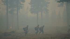 Rain helps as Central Oregon fires threaten 6,000 structures